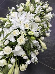 Sympathy funeral flowers Cornwall casket spray Helston