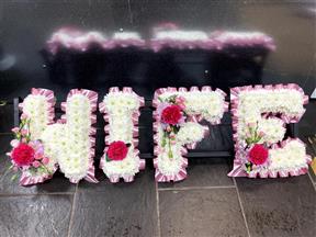 wife funeral flowers W J Winns